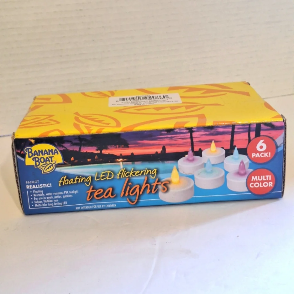 Banana Boat 6 Pack Floating LED Flickering Tea Light Candles Multicolor NIB